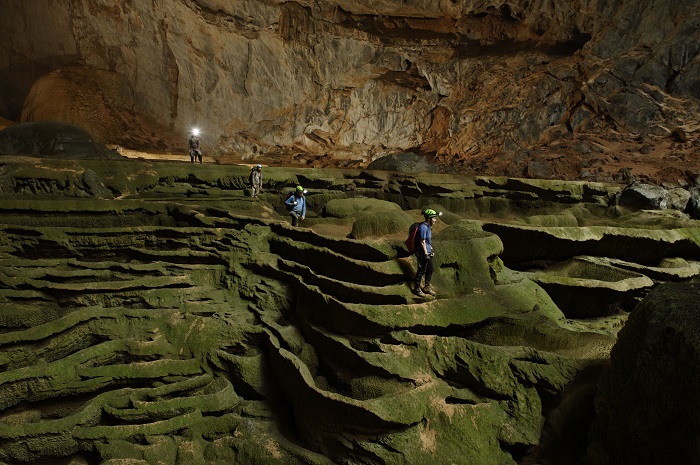 VIETNAM - MAY 02: Hang Son Doong explorers navigate an algae-covered cavescape. (Photo by Carsten Peter/National Geographic/Getty Images)